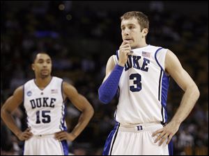 Duke point guard Greg Paulus (3) might return to football despite not taking a snap in a game since 2004.