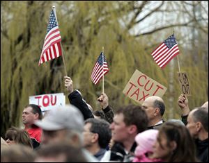 Protesters at Toledo's Tea Party in International Park decried the bailout, big spending, and taxes. 