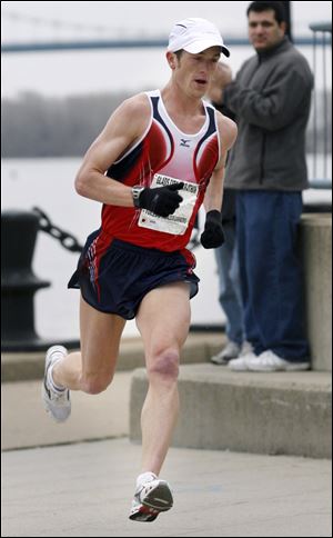 Ryan Desgrange heads to the finish line to win the Glass City Marathon in 2006. He's now 29. 