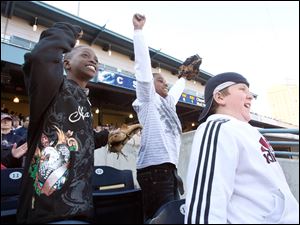From left, Richard Hackney, Keyaunte Jones, and Wesley Doxsie were rockin  the Hen House at the home opener at Fifth Third Field last night in Toledo. The record crowd of 13,100 wasn t enough to keep the Hens from falling to Columbus. 