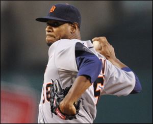 The Tigers' Edwin Jackson works against the Los Angels in the first inning.