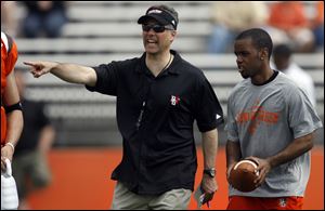 New Bowling Green State University coach Dave Clawson directs players during the spring game at Perry Stadium.