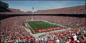 A national record crowd for a spring game watched Ohio State s Scarlet & Gray game Saturday when 95,722 fans came to Ohio Stadium. The Buckeyes open the 2009 season Sept. 5 against Navy.