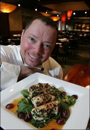 LaScola Italian Grill chef Chris Dewart with his Chicken Involtini