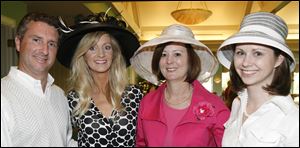 <br>
Claudia Richmond, left, Theresa Andrews, and Christina Stacy want their mint juleps during the Kiwanis Kentucky Derby Party at Inverness Club. Also pictured is Chris Seiple.
<br>
<img src=http://www.toledoblade.com/graphics/icons/photo.gif> <font color=red><b>PHOTO GALLERY</b></font>: <a href=