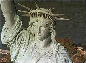 FILE - This undated file photo shows a close up of the Statue of Liberty. Interior Secretary Ken Salazar announced Friday, May 8, 2009 that the statue's crown will reopen on July 4 for the first time since the Sept. 11, 2001, terrorist attacks. (AP Photo/File)