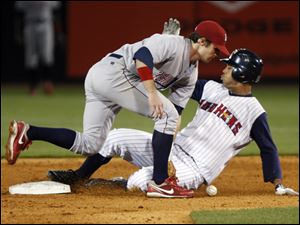 The Mud Hens' Wilkin Ramirez steals second base in the fourth inning when Jason Donald can't come up with the throw.