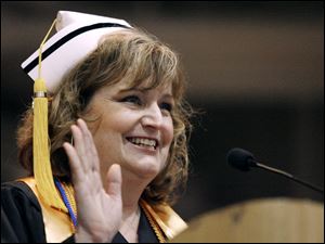 Slug: CTY OWENSGRAD08P B         The Blade/Jeremy Wadsworth  Date: 05/08/09  Caption: Laura Drouard, of Rossford, a registered nursing program graduate speaks during commencement ceremonies Friday, 05/08/09, at Owens Community College.