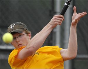 Northview s Bill Rachwal keeps his eye on the ball. He and Adam Jurski won the NLL title at No. 1 doubles Friday at BGSU and remained unbeaten.