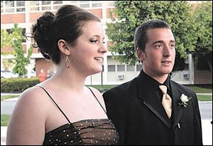 Tyler Frost went to the Findlay High School prom with girlfriend Rebecca Smooty. There he was photographed holding hands with his date, which his own school, Heritage Christian, forbids, along with rock music and dancing. While he faces the consequences, Tyler said he 'had fun and nothing dumb or bad happened or anything.' The case is being likened to the movie 'Footloose.'
