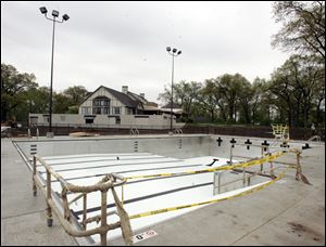 One of the two new swimming pools at Stone Oak Country Club is part of $2 million in improvements made at the Springfield Township facility to help stem diminishing membership. 