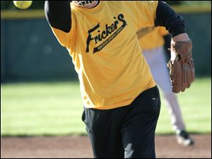 Bob Miller pitches one to the Allshred Services batter.
