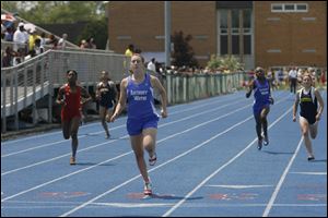 Anthony Wayne's Erika Schmidt takes first in the 200.