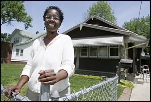 Paullette King found help through Toledo s nonprofit Fair Housing Center to catch up with the payments on her Upton Avenue home.
