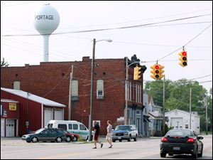 The Ohio Department of Transportation says the only traffic light in Portage, Ohio, is no longer needed and should come down.