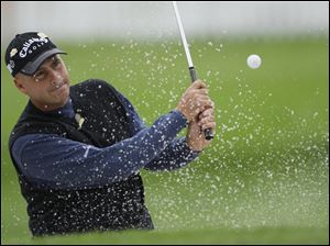 Rocco Mediate practices hitting out of the sand at Bethpage Black yesterday. He lost to Tiger Woods in a Monday playoff last year.