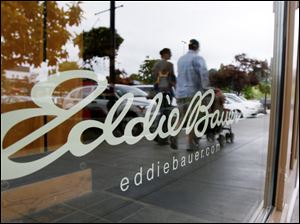 As the economy soured and sales nosedived, Eddie Bauer Holdings filed for bankruptcy protection. CCMP Capital Advisors LLC has bid $202 million in cash for its assets. CCMP representatives have agreed to keep most of the 371 stores open and retain many employees.