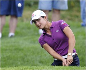 Lorena Ochoa of Mexico, hits from the bunker on the ninth hole during the first round of the LPGA Championship golf tournament, Thursday, June 11, 2009, in Havre de Grace, Md. (AP Photo/Gail Burton) 
 
s1 28s1ochoa color 4 col x full ... for FARR TAB 

