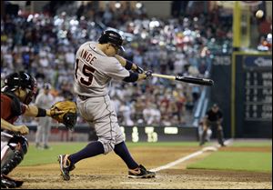 Brandon Inge sends Houston pitcher Jose Valverde's fastball on its way over the fence for a game-winning home run.