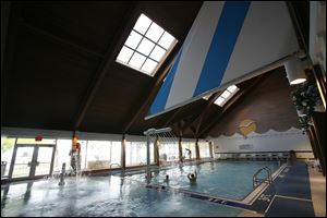 The pool at Maumee Bay Resort  boasts new water splash features, including a waterfall and a sprinkler. These features were added during a $1 million renovation project. The resort held an open house so those interested could take a peek at the additions and renovations.