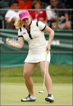 Mikaela Parmlid drained a birdie putt on the 18th hole to finish off a round of 62 Saturday. She is six shots out of the lead.
<br>
<img src=http://www.toledoblade.com/graphics/icons/photo.gif> <font color=red><b>VIEW</b></font>: <a href=