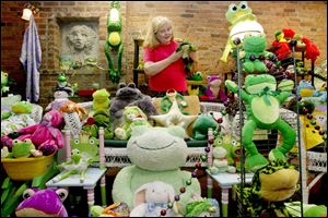 Amy Adler spent about six months assembling 300 or so items, including stuffed frogs, ceramic frogs, singing frogs, and the museum's newest addition, a live barking tree frog named Figaro. 