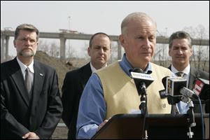 The Marina District project, topic of a 2007 news conference, is one of the projects that Mr. Finkbeiner will not be in office to see to completion. At right is Larry Dillin, the project developer.