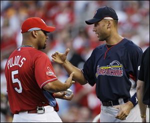 Albert Pujols of the Cardinals, left, and Derek Jeter of the Yankees congratulate each other after receiving awards for being the top All-Star vote-getters in their leagues.