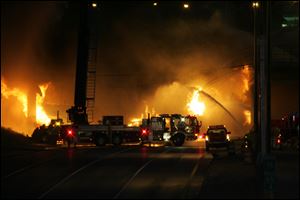 The fire that was fed by 13,000 gallons of fuel from a tanker-truck explosion on  I-75 caused an overpass to collapse onto I-75 north of Detroit on Wednesday night.