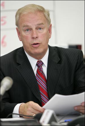 Gov. Ted Strickland exercised his veto power on 61 items in the budget bill he signed Friday.