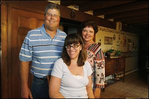 Tim and Terry Fejes of Martin, Ohio, with their 17-year-old daughter, Marlee Hope.