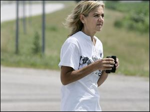 Cindy Koepfer has gone to a Clay Township field nearly every day since April to try to catch a scruffy stray.