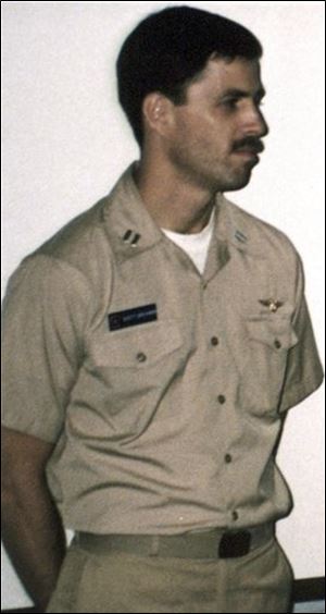 This a photo of Michael Scott Speicher made aboard the carrier USS Saratoga in June 18, 1990 when he was promoted to Lt. Commander. Speicher, whose jet fighter went down Jan. 17, 1991 over Iraq, has been missing ever since. Officials said Sunday Aug. 2, 2009, the Armed Forces Institute of Pathology has positively identified the remains of Captain Michael 