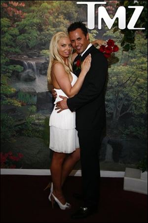 This photo provided by TMZ, shows Ryan Alexander Jenkins and Jasmine Fiore's March 18, 2009 wedding in Las Vegas. Jenkins, a reality TV contestant, is charged with killing his wife, a former swimsuit model. 
