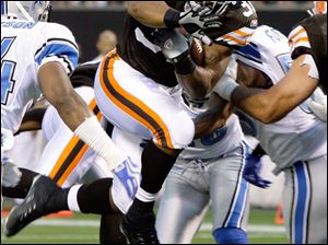 Cleveland running back Jamal Lewis slashes throught the Detroit Lions' defense for a touchdown during a preseason game. Lewis, who turned 30 yesterday, has rushed for more than 1,000 yards in each of the last two seasons for the Browns.
