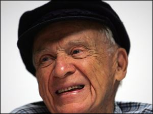 Detroit Tigers Hall of Fame broadcaster Ernie Harwell speaks Tuesday, Aug. 21, 2007, in Detroit.