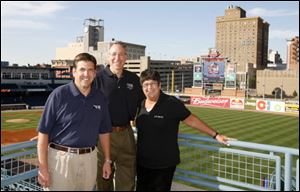 Bill Kitson, left, Richard Hylant, and Kim
Sidwell at the United Way event.