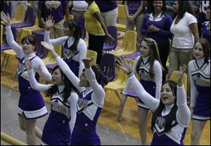 Waite's cheerleaders help the freshmen get into the right spirit by leading them in one of the Indians' cheers.