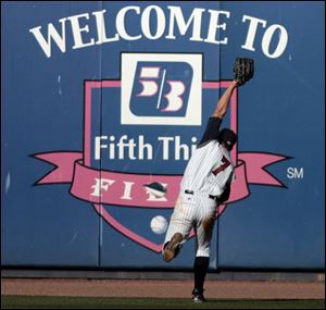 Mud Hens center fielder Ryan Rayburn makes a running catch against Columbus on April 17.
<br>
<img src=http://www.toledoblade.com/graphics/icons/photo.gif> <font color=red><b>PHOTO GALLERY</b></font>: <a href=