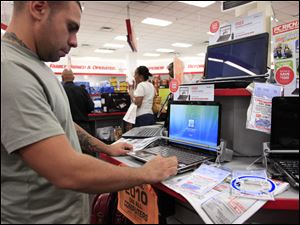 Although layoffs have slowed, the number of Americans worried about their jobs rose in September. That meant more consumers are wary about buying big-ticket items such as computers.