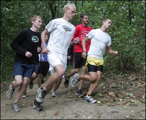 From left, Mike Wallace, Nick Homan, Sean O'Connell and Jacob Barnes lead the Northview boys cross country team in practice.