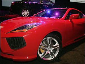A hybrid sports car is one of four models GreenTech Automotive Inc. hopes to produce in a factory it proposes for Tunica, Miss.