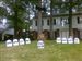 Royal Barber, a candidate for Sylvania Township trustee, displays the names of his opponents on his yard's Halloween display.