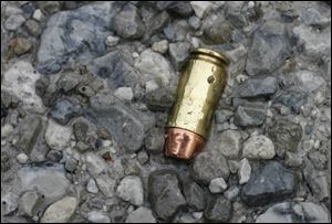 Police found this unspent round and shell casings at the Route 66 Kitchen. The gunmen have not been identified.
