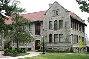 The nearly century-old building now called Laird Hall will keep its exterior and be transformed inside into a home for educating 21st-century business majors. When work is completed in July, the structure will be renamed Adams Hall.