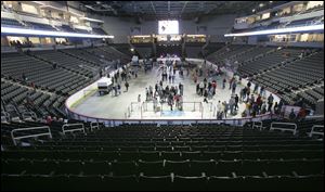Visitors get a glimpse of the new sports arena in downtown Toledo.
