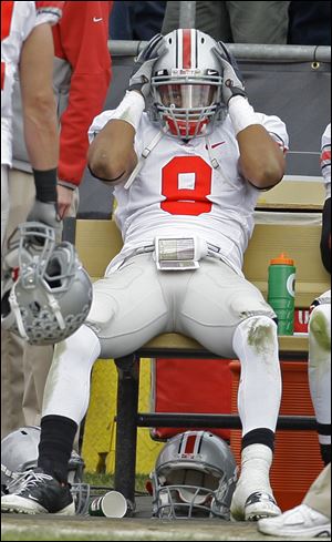 Ohio State DeVier Posey reacts on the bench late in the game. The Buckeyes fell to 5-2, 3-1 in the Big Ten.