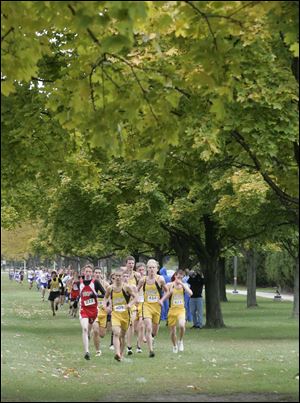 Northview's Jacob Barnes leads the pack in the boys Northern Lakes League cross country meet. Barnes took first in 15:57 and the Wildcats took the top six spots and seven of the top nine. Southview's Lexi Lopez won the girls individual crown with a time of 18:42.