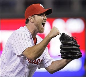 Philadelphia Phillies' Brad Lidge reacts after winning Game 5 of the National League Championship baseball series over the Los Angeles Dodgers Thursday in Philadelphia. The Phillies defeated the Dodgers 10-4 to win the National League Championship. 