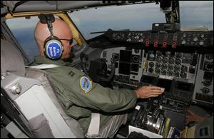 Capt. Rob Cruea guides a KC-135 tanker toward a refueling rendezvous with F-16s from Toledo. Captain Cruea is with the 121st Air Refueling Wing.